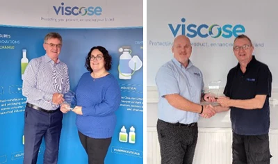 Emma Blackmore and Vince Moses receiving Viscose long service awards