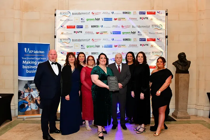 Viscose team holding award