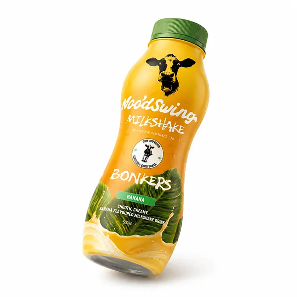 A milkshake bottle with a decorative shrink sleeve